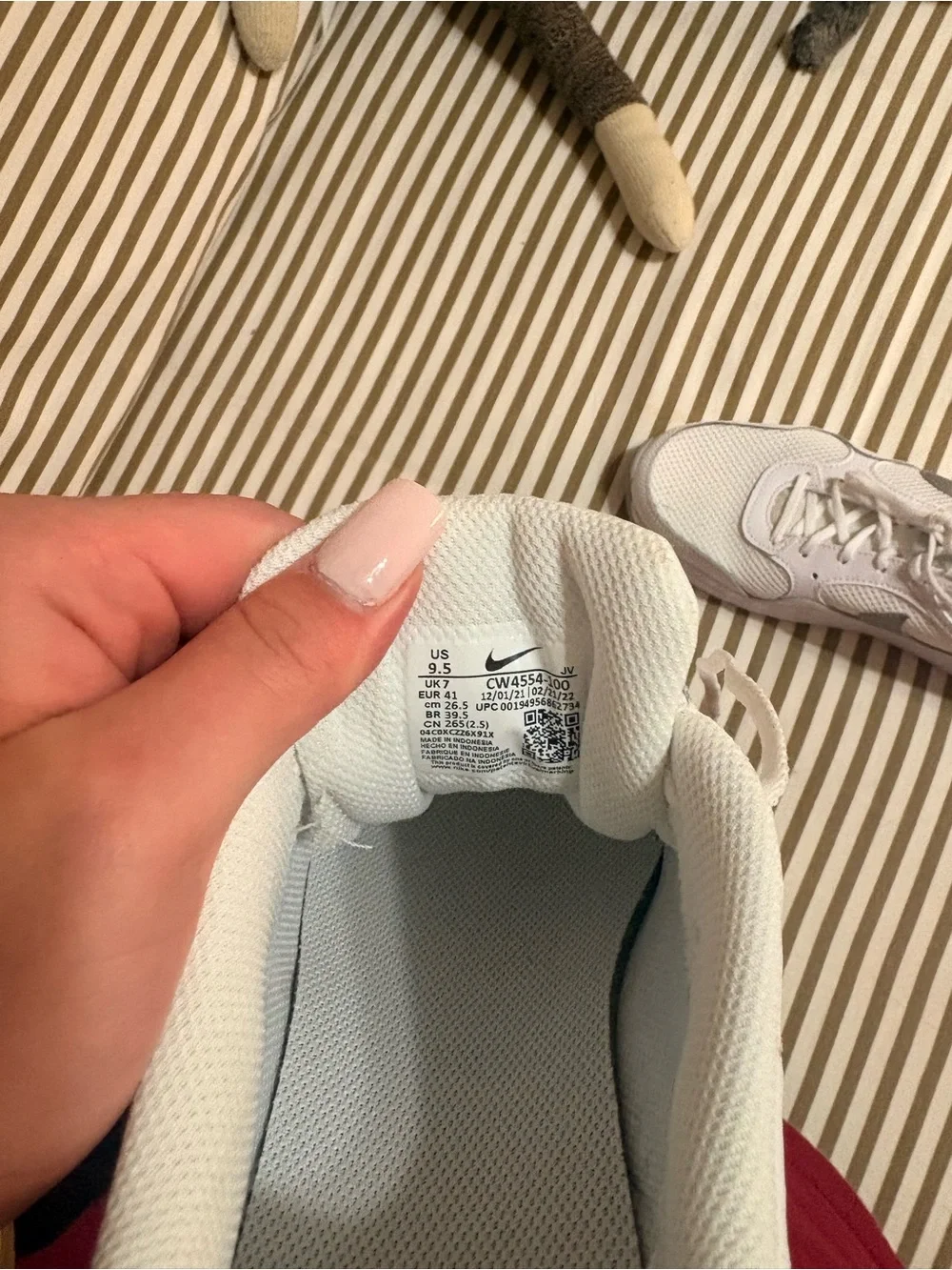 Nike Women’s White Sneakers with Silver Swoosh